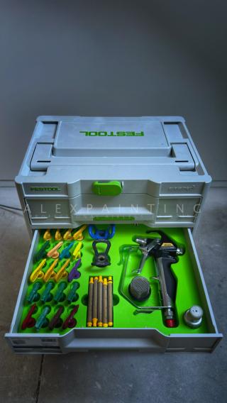 A middle Sortainer drawer holding a Wagner Vector Pro spray gun, a filter, and rows of colorful reversible spray tip guards in a green 3D-printed insert
