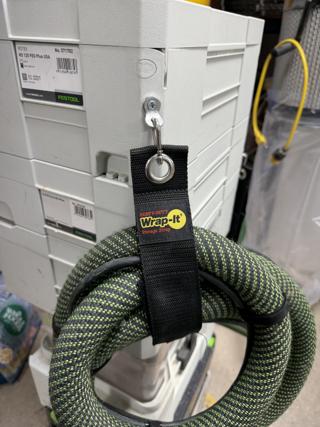 A Hose Strap on a Dust Extractor Stack