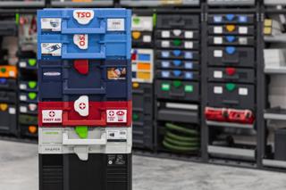 A stack of Systainers from different System Partner brands, including TSO Products, SurfPrep, Festool, and Shaper